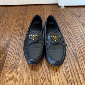 Prada Black Leather Loafers with Gold Logo